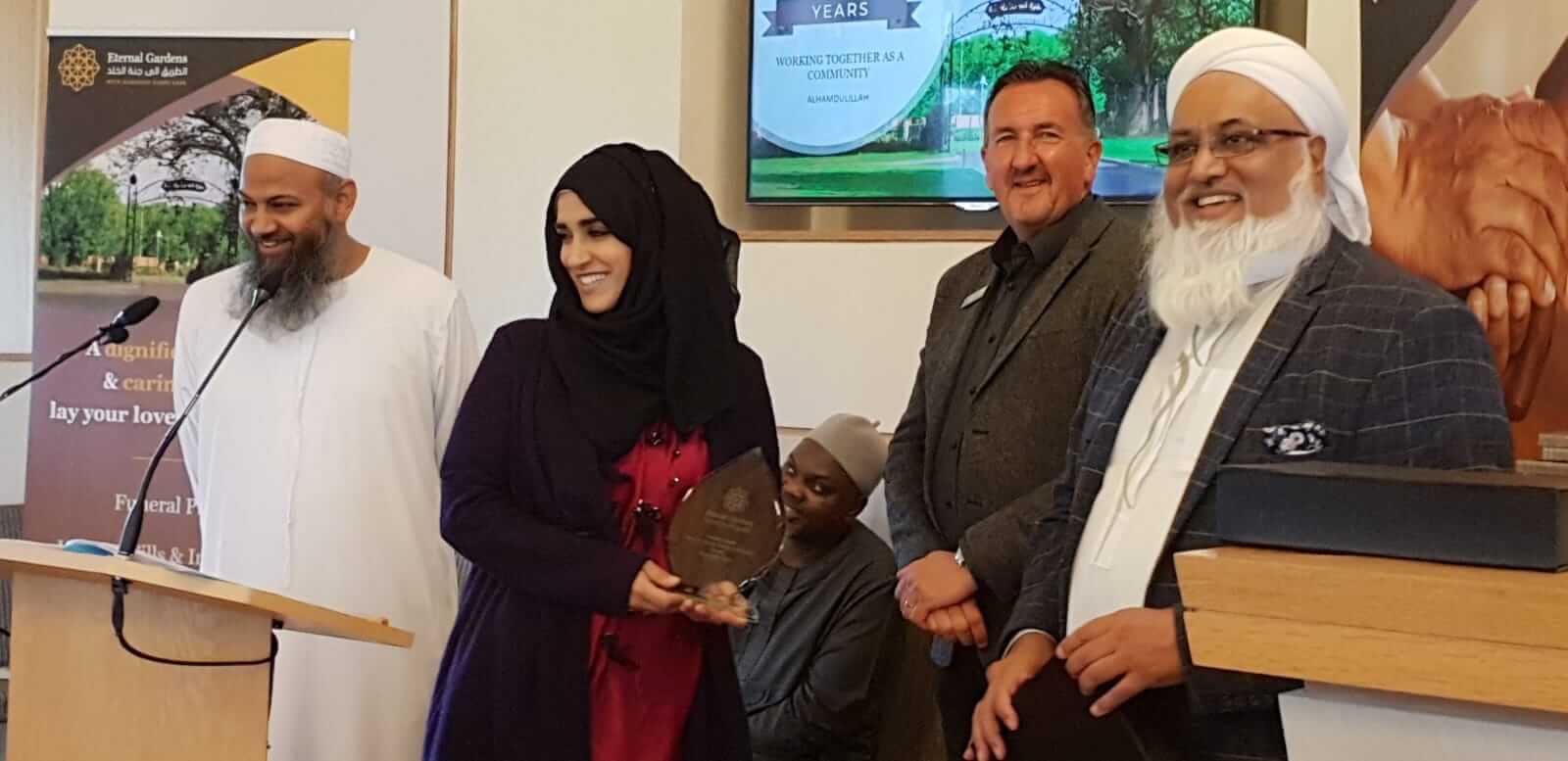 Ayesha-Aslam-and-Eternal-Gardens-on-Islam-and-Mental-Health-award-1 Ayesha Aslam holding Award